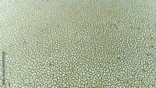 Obraz na plátně High angle view of uniform hexagonal patterns in dry cracked clay on a vast drie