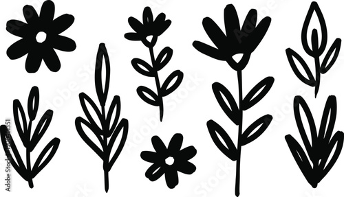 set of black silhouettes of flowers and leaves on white background