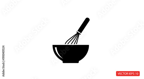 Black bowl with whisk inside kitchen.