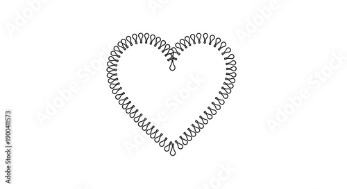 Coiled spring wire heart shape object.