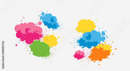 Vibrant paint splatters in mid-air, creating a dynamic display of colorful shapes and patterns from a close-up viewpoint