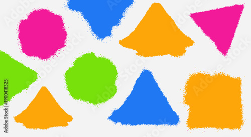 Vibrant abstract shapes in various colors and forms arranged randomly on a clean background viewed from directly above