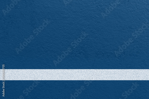 Tennis court surface background with blue textured ground and a clean white court line