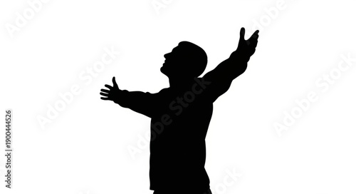 Silhouette of a man with arms raised in celebration.