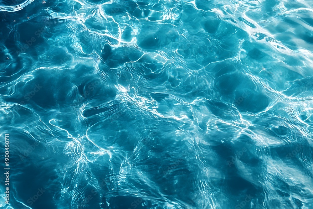 Fototapeta premium Calming blue water surface with gentle ripples and reflections