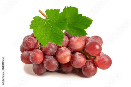 Fresh Red Grapes Bunch with Green Leaves Isolated on White on white background.
