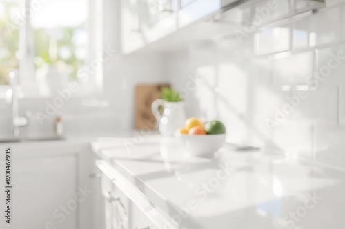 Bright White Kitchen Counter with Fresh Citrus Fruit Bowl, Pitcher, and Sunny Window Light.