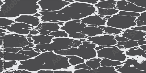 Abstract cracked surface texture with irregular shapes and lines.