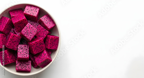 Freshly Diced Dragon Fruit Cubes in a Bowl, Vibrant Pink Fruit Pieces Ready for Consumption
