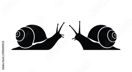 Two snails crawling forward a striking black silhouette