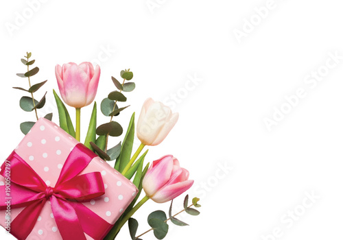 A beautifully wrapped gift box with a pink ribbon and bouquet of tulips on a black background