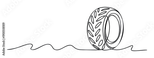 Simple continuous line drawing of a durable tire with a distinct tread design on a winding road representing motion and journey for transportation industry presentations and brochures