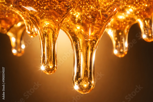 Golden honey dripping texture macro background