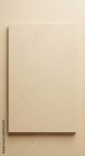 Rectangular beige panel casts a subtle shadow against a similarly toned background