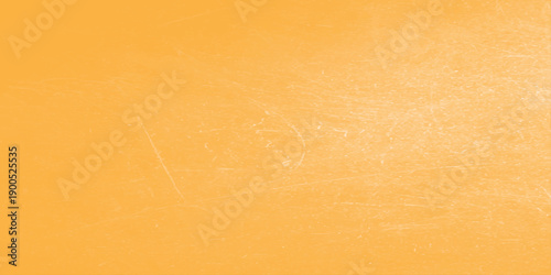 A vintage orange grunge background with aged brown parchment texture and antique paper pattern provides a blank retro material design for a dirty ancient page backdrop