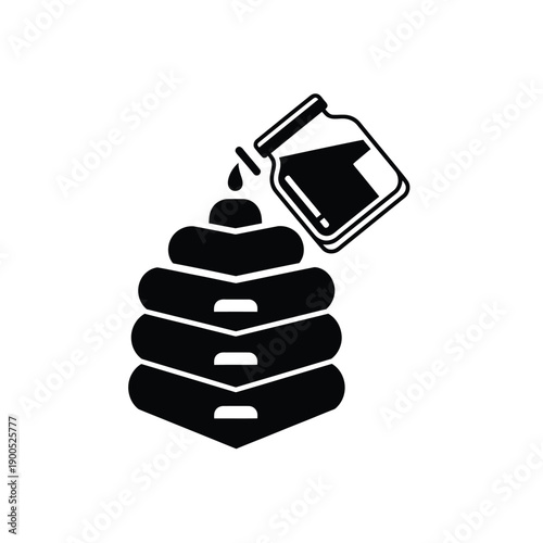 Stacking rings toy with liquid pouring from jar, developmental toy for baby cognitive skill development, educational plaything for child learning and fun.