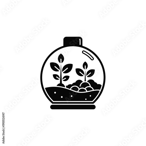 Closed terrarium in spherical glass container with two growing plants representing miniature self-sustaining ecosystem for botanical enthusiasts and home decor