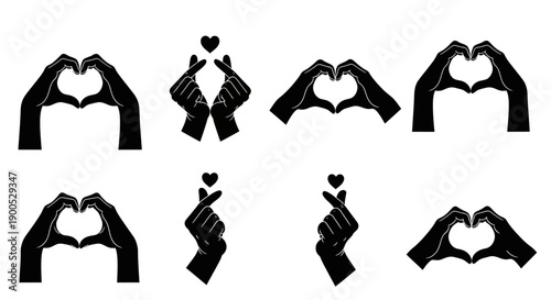 Black silhouettes of hands forming heart shapes and finger gestures