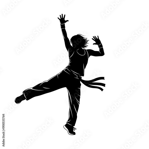 Silhouette of a person dancing with arms raised in energetic motion