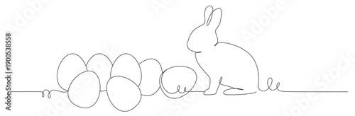 Continuous line art of a bunny and some Easter eggs beside it. This image is to commemorate Easter. Vector illustration.