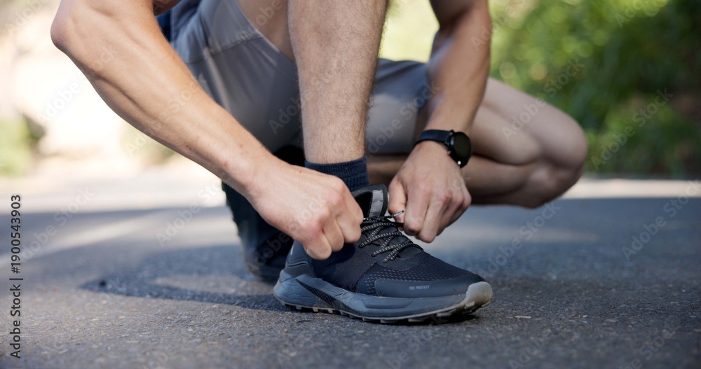 Obraz premium Hands, lace tie and man in street, fitness and sneakers for comfort, challenge and exercise. Routine, person and runner with wellness, shoes and workout for health benefits, athlete and practice