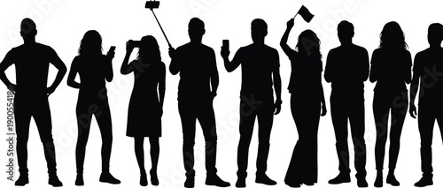 Silhouette of a crowd of people using smartphones and taking selfies with a selfie stick at a concert, event, or public gathering
