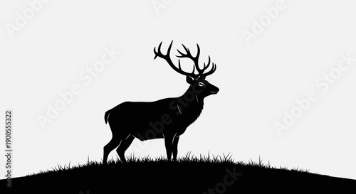 Majestic Silhouette of a Stag with Antlers on a Grassy Hilltop Against a White Background