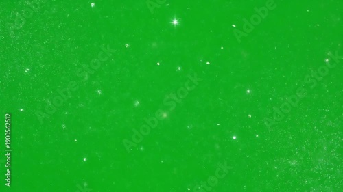 Green Screen Background with Sparkling Particles for Visual Effects Compositing with Bright Lighting