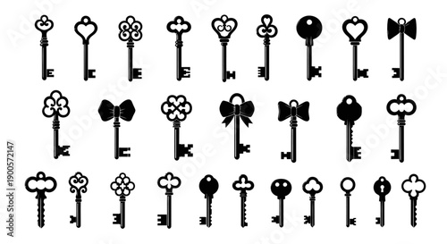 A collection of black silhouette vintage and ornate skeleton keys with various decorative designs on a white background.