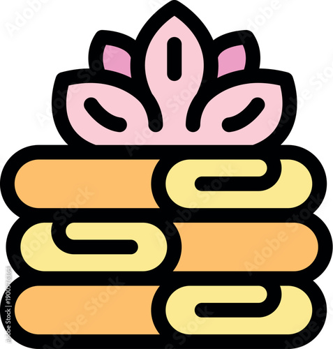 Soft, fluffy towels stacked neatly with a delicate lotus flower on top, creating a serene spa atmosphere