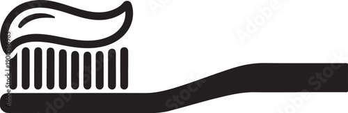 A close-up view of a toothbrush with toothpaste on its bristles