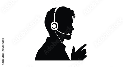 Silhouette of a man wearing a headset and gesturing with his hand