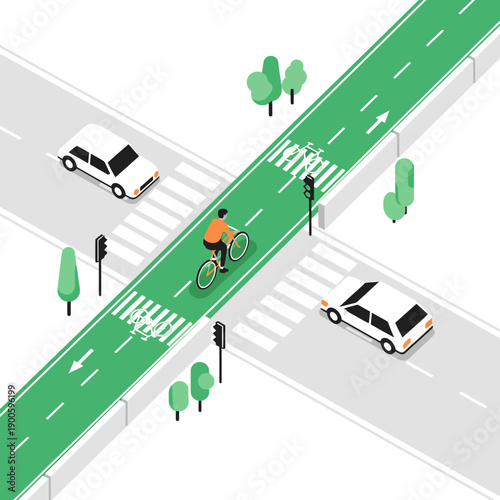 Cyclist crossing intersection on dedicated bike lane, urban traffic