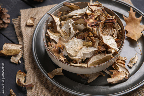 Bowl with tasty dried mushr...