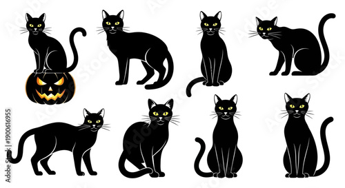 A collection of eight black cats with yellow eyes, some sitting and some standing, with one cat perched on a carved pumpkin.