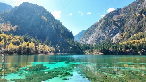 Scenery Jiuzhaigou national park in Sichuan, China. Beautiful Five Flower Lake in Autumn season. Famous Landmark and Vacation near Chengdu, China. Asia travel concept