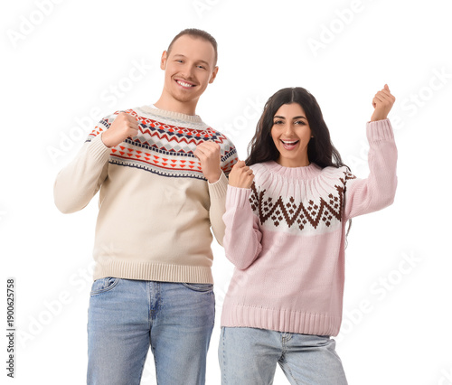Happy young couple in warm ...