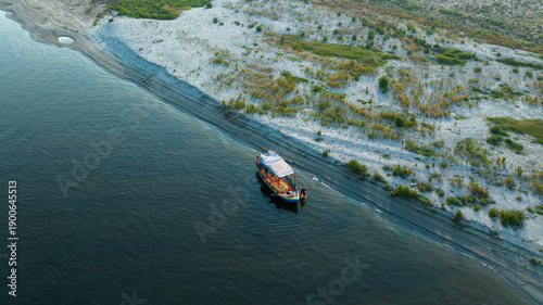 Boat ride on the Yamuna River in Mathura, capturing daily life, religious atmosphere, and traditional river transport in a historic Indian pilgrimage destination