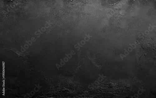 Dark grey black slate background or texture. black stone. Texture of black decorative plaster or concrete. Abstract grunge background for design.