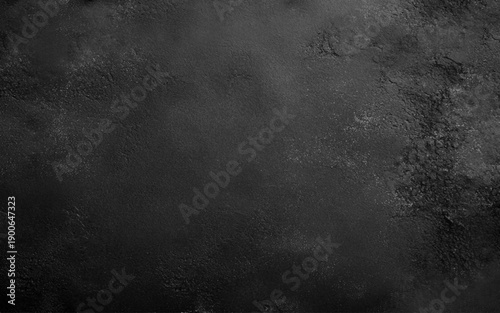 Texture of black decorative plaster or concrete. Abstract grunge background for design.. Black texture dark slate background. Beton concrete surface.