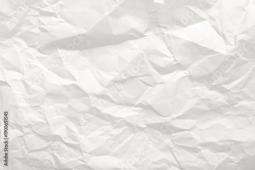 Crumpled sheet of paper as background, top view