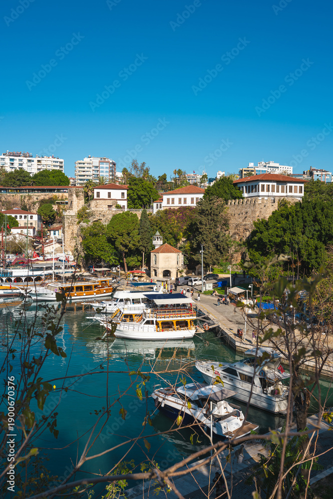 Fototapeta premium View of the Old Town Antalya Marina and tour boats in Kaleici
