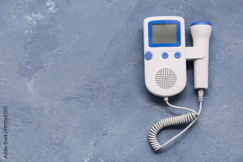 Fetal doppler on blue grung...