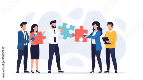 Teamwork and collaboration: People assembling puzzle pieces for business success