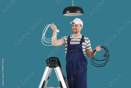 Male technician with wires ...