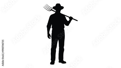 Silhouette of a farmer carrying a pitchfork over his shoulder