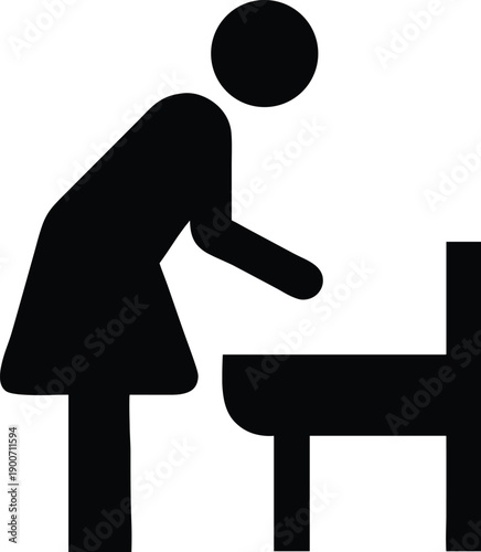 Black silhouette icon representing a parent assisting a child with a toilet, indicating a restroom facility.