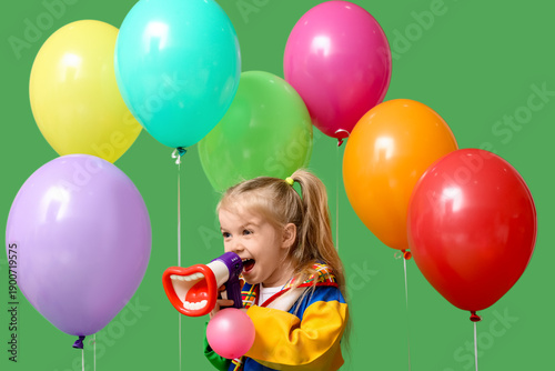 Little girl in clown costum...