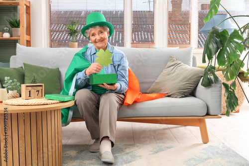 Happy senior woman in lepre...
