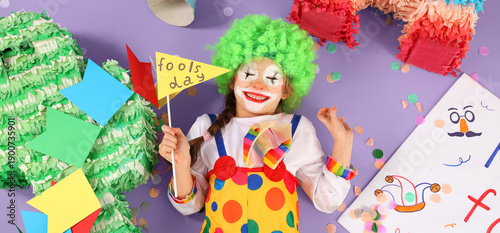 Funny little girl in clown ...